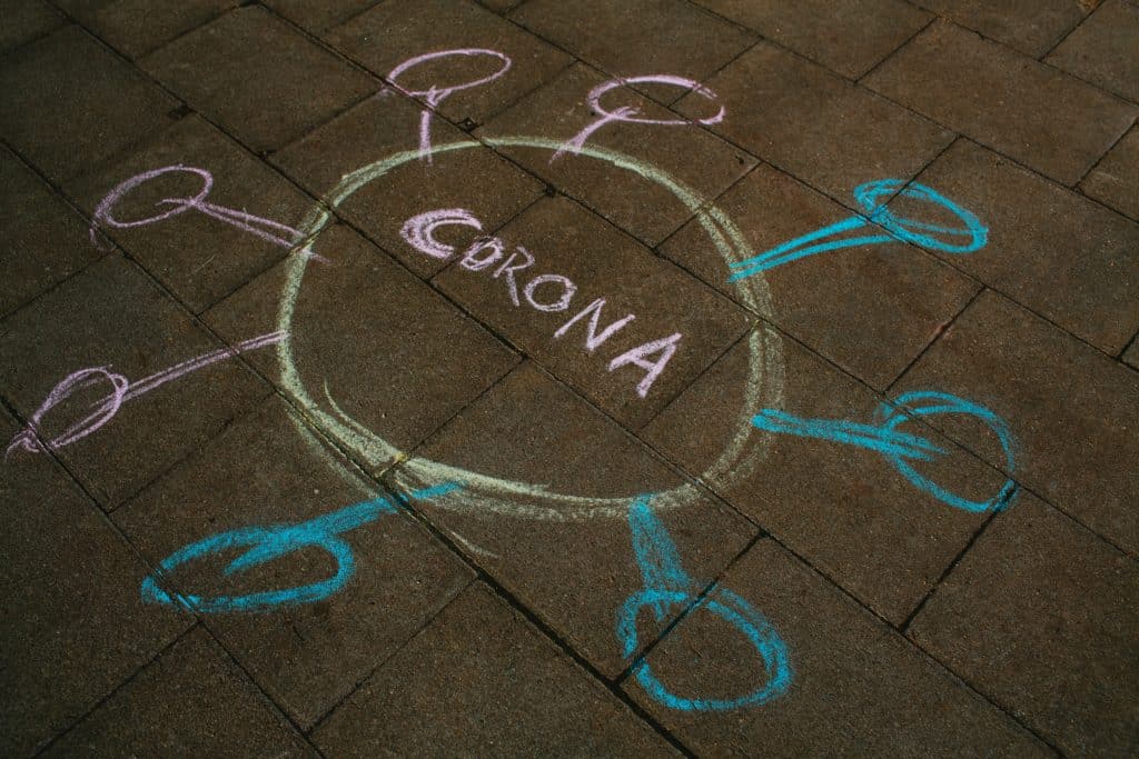 Chalk crayon symbolic imagery Coronavirus disease outbreak COVID-19 – warning alarm message
